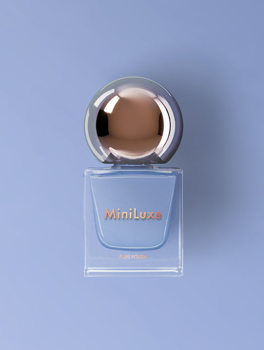 MiniLuxe Pure Polish Bridgette's Blue bottle blue background