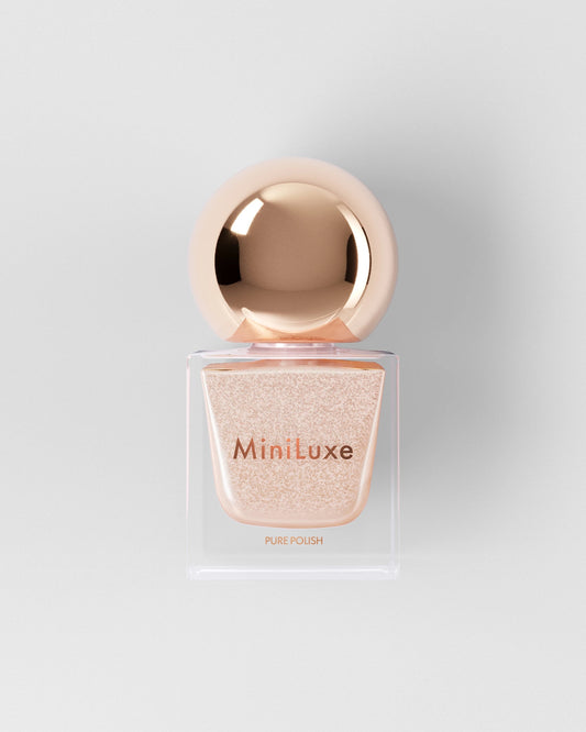 MiniLuxe Pure Polish Champagne shimmery pink bottle