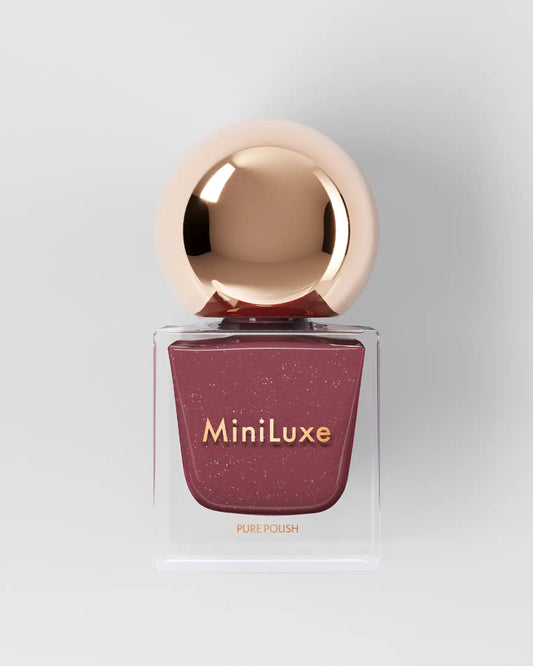 MiniLuxe Pure Polish Desert Rose shimmery pink bottle