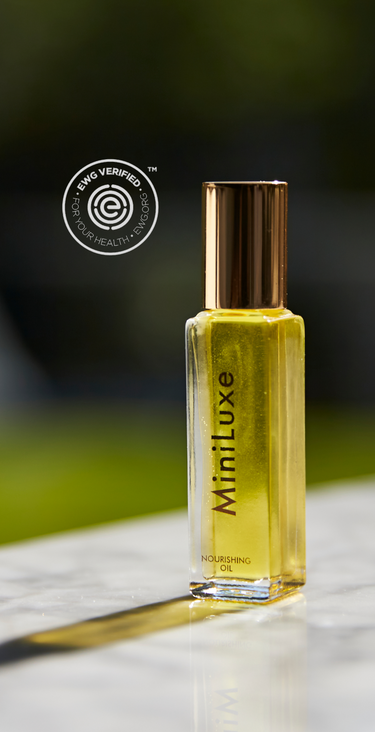 cuticle oil being applied to nails