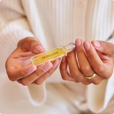 cuticle oil being applied to nails