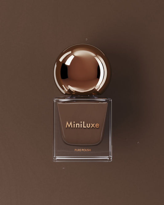 MiniLuxe clean nail polish Fudgesicle brown bottle brown background