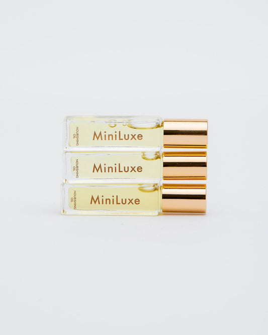MiniLuxe Cuticle Oil Rollerball trio stacked horizontally